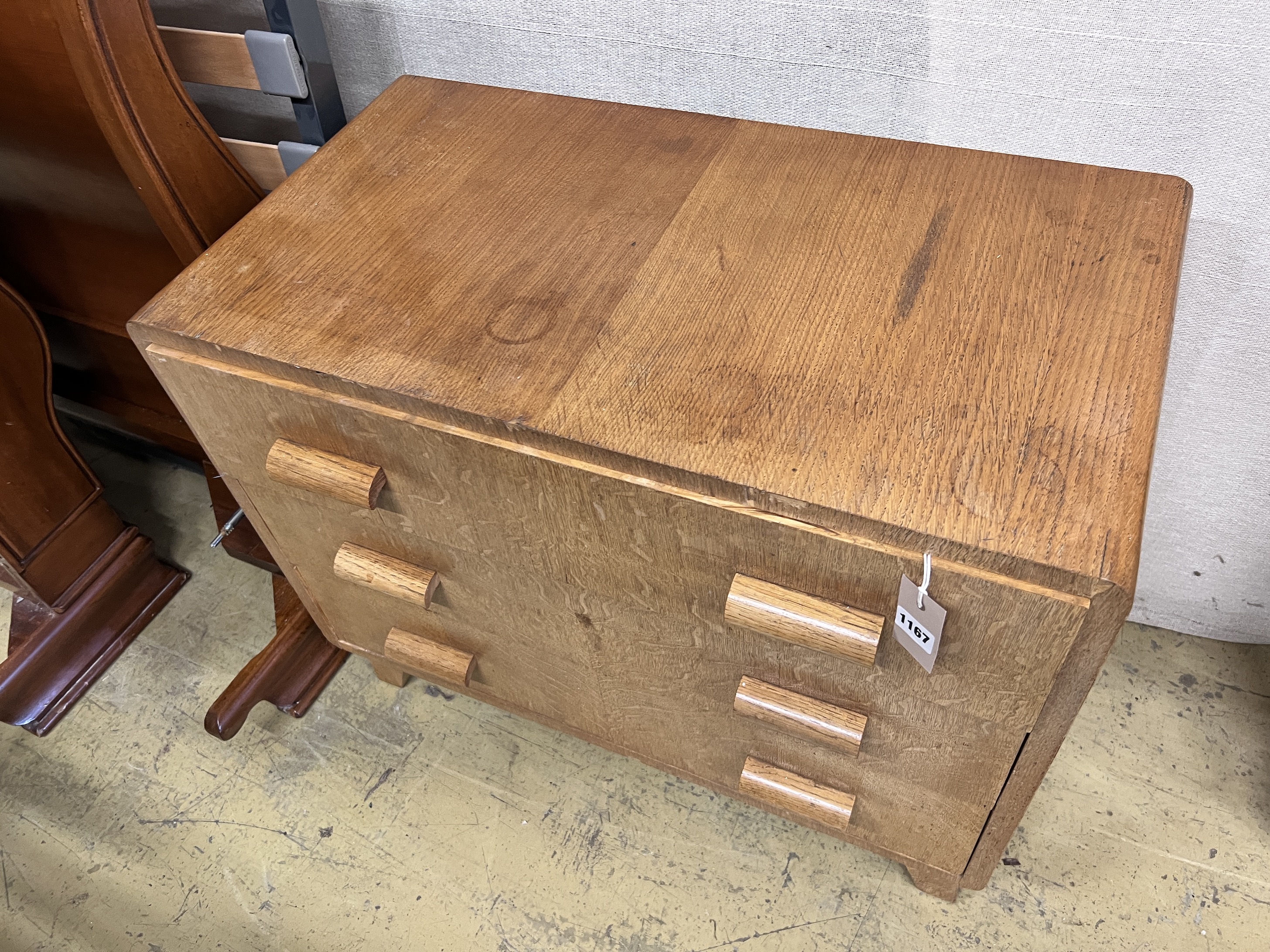 A mid century oak chest of three drawers by PE Gain, width 76cm